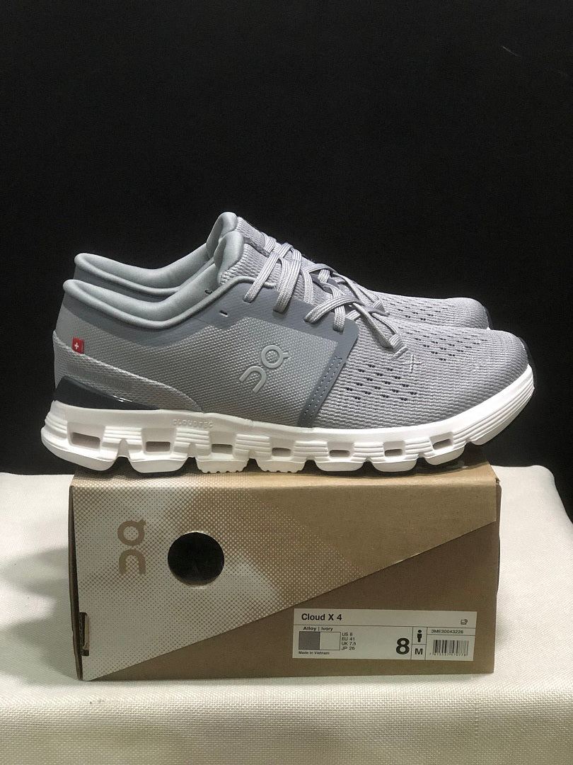 On Cloud X 4 Sneakers in Alloy and in Ivory - product image from the listing.