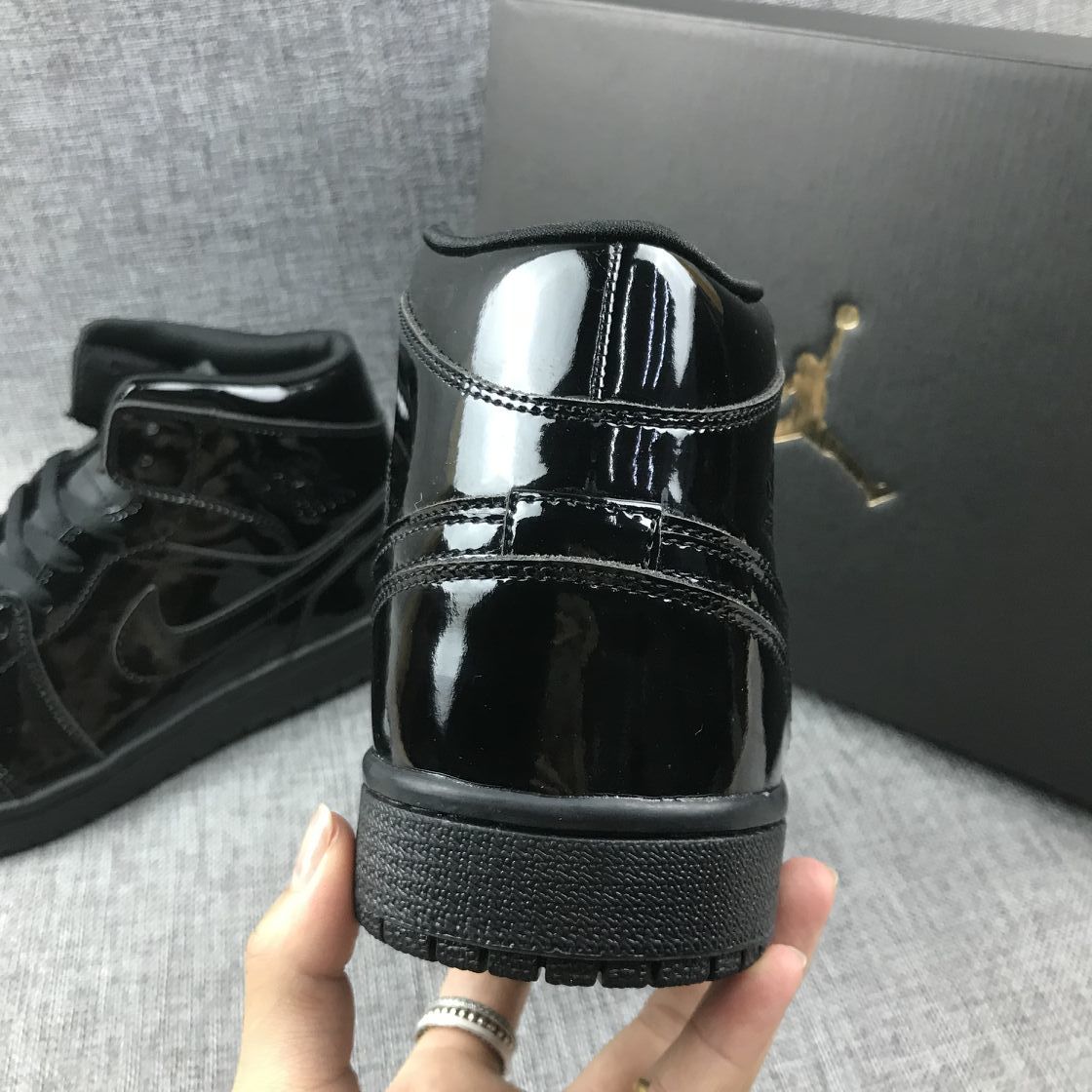 Black Patent Sneakers - Air Jordan 1 Mid BQ6472-002 - product image from the listing.