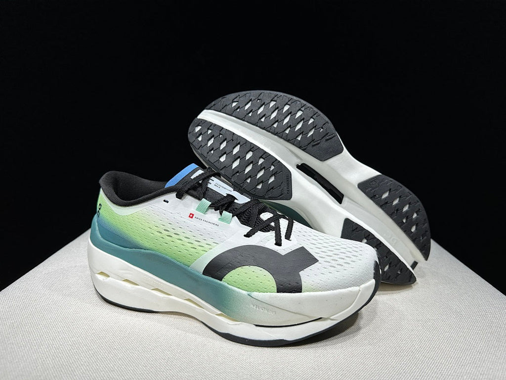On Cloudboom Max Running Shoes, in White and Green - product image from the listing.