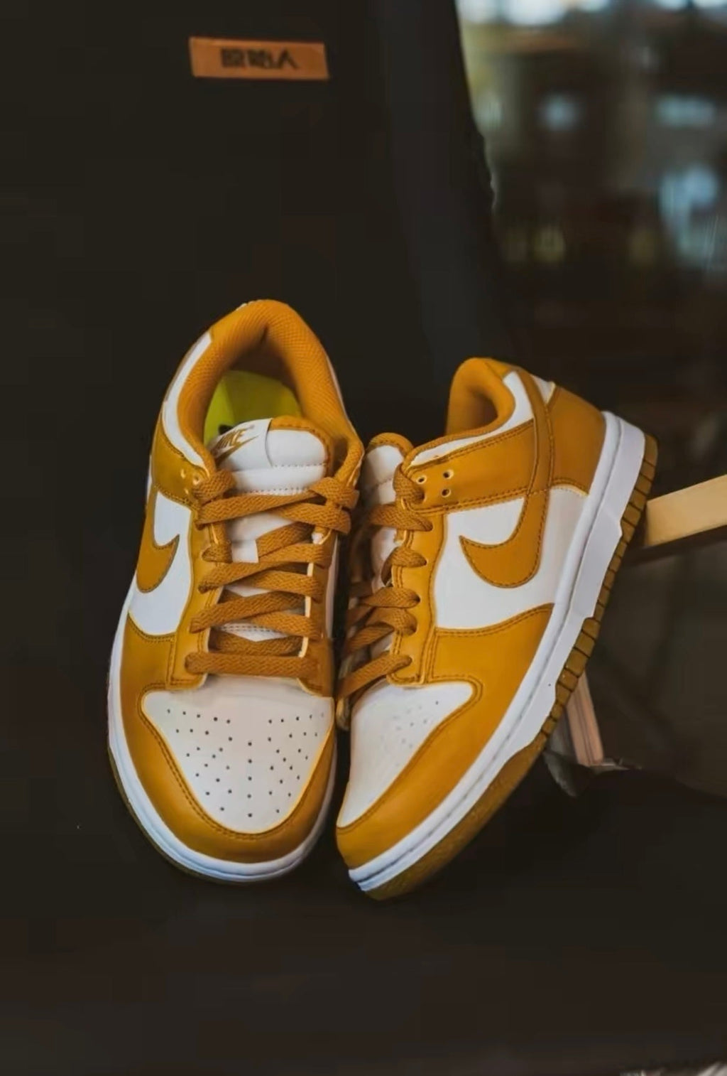 Nike Dunk Low Next Nature Sneakers in White and Brown DN1431-001 - product image from the listing.