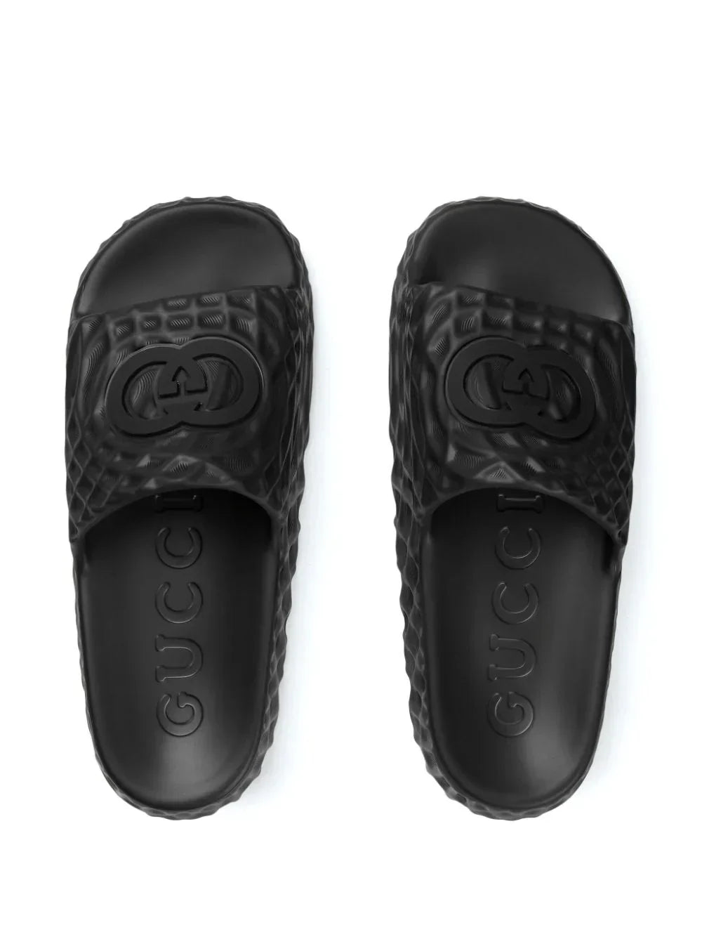 Interlocking G-appliqué textured slides by Gucci - product image from the listing.