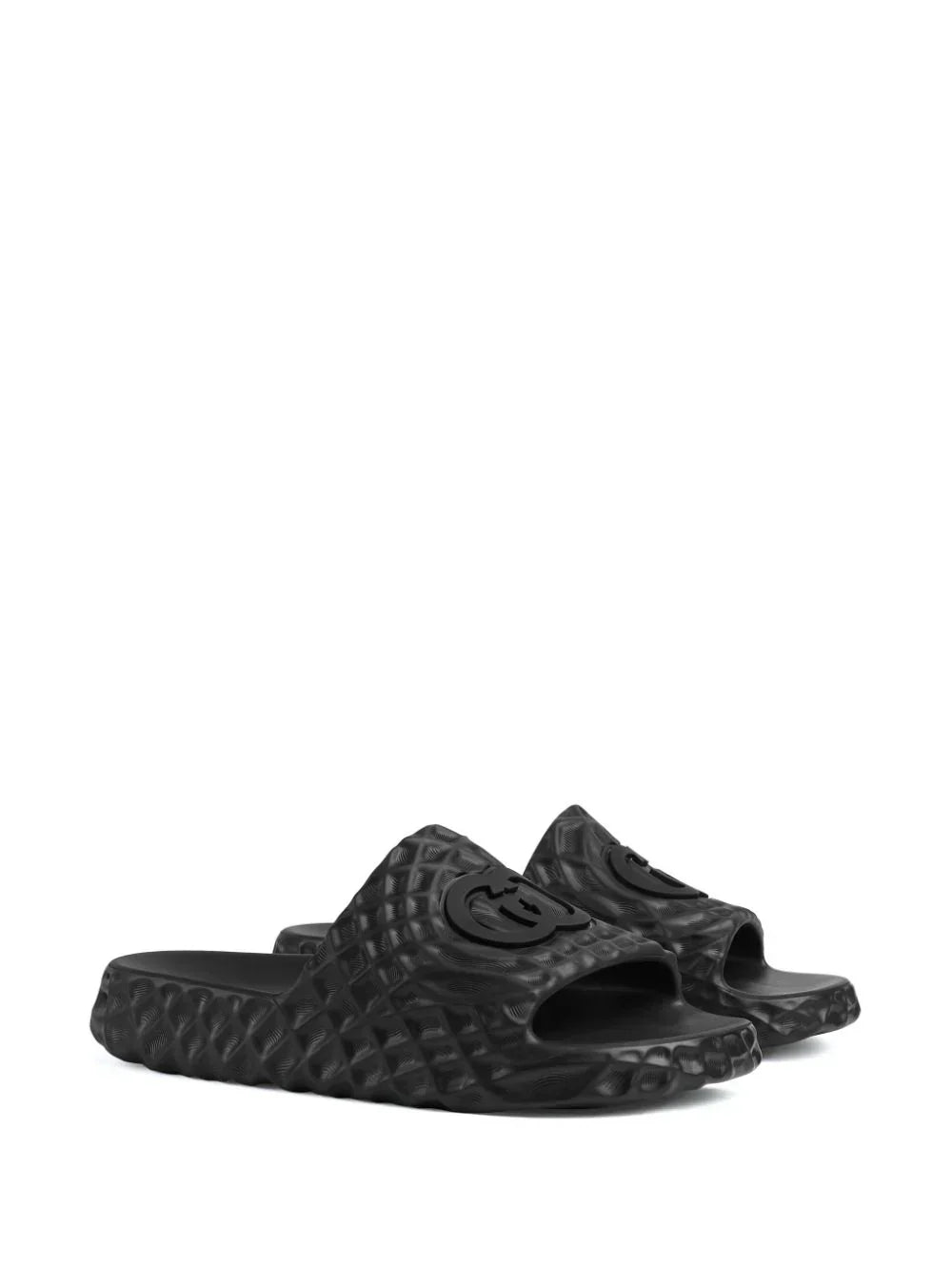 Interlocking G-appliqué textured slides by Gucci - product image from the listing.