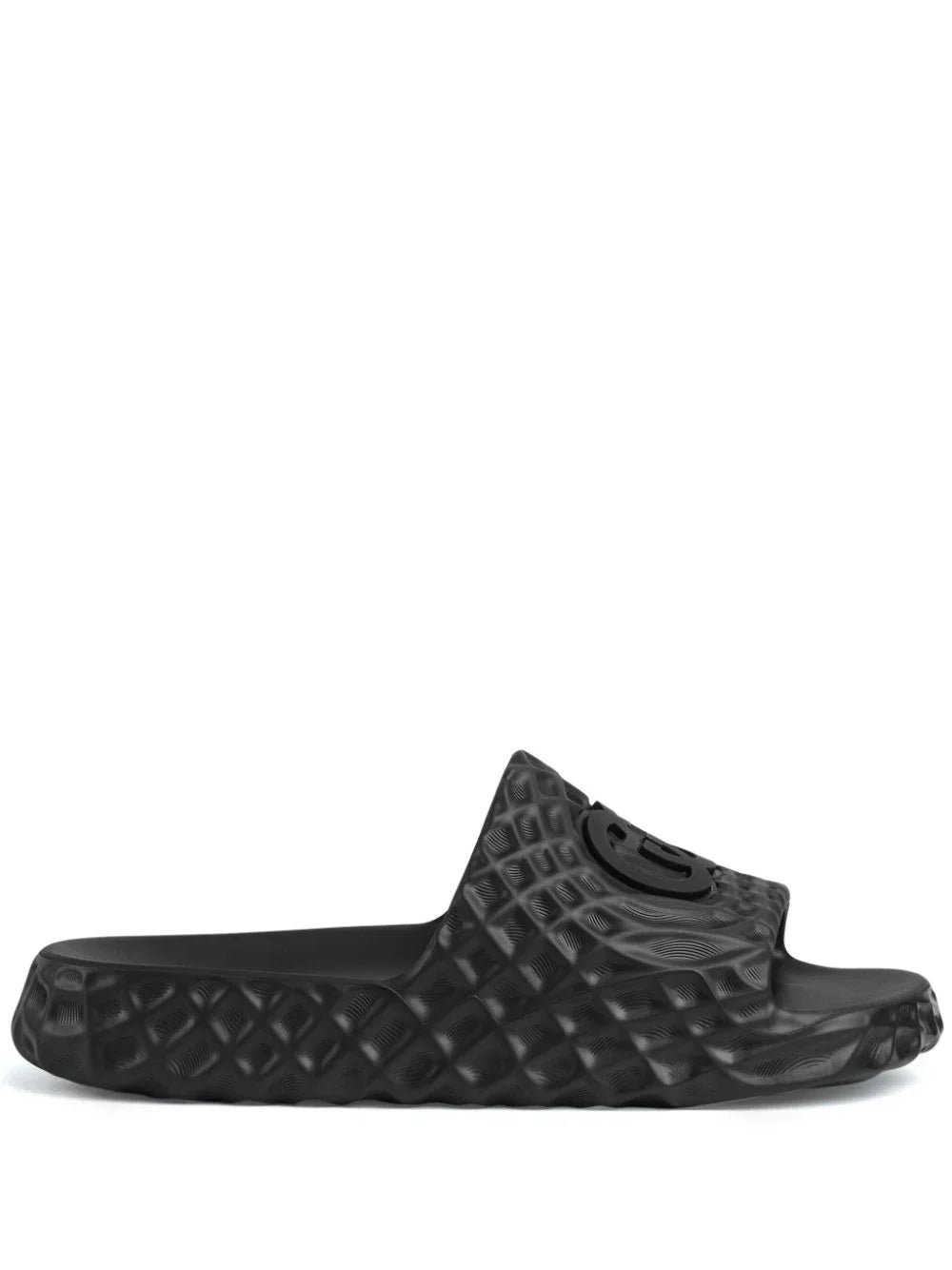Interlocking G-appliqué textured slides by Gucci - product image from the listing.