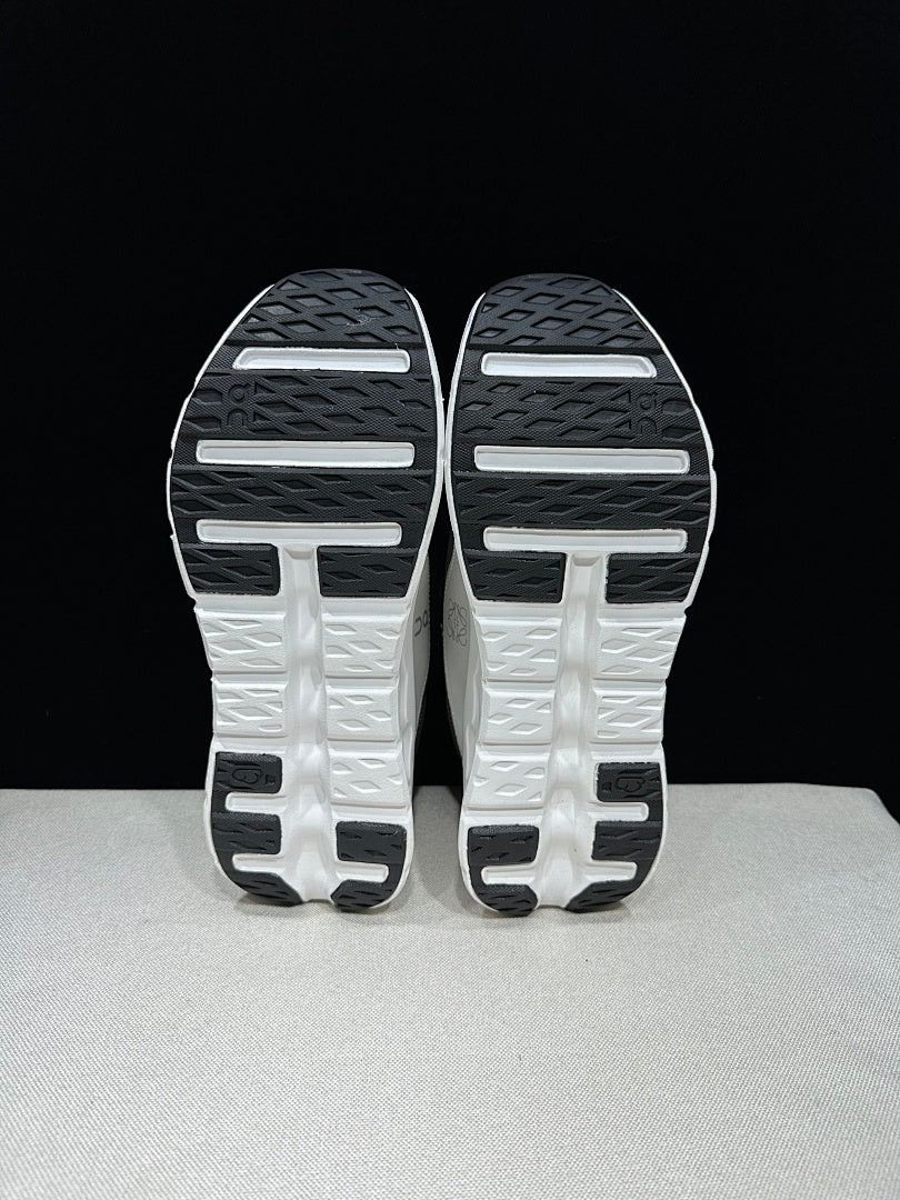 On Cloudtilt 2.0 Sneakers in White and Black - product image from the listing.