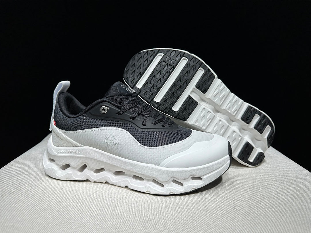 On Cloudtilt 2.0 Sneakers in White and Black - product image from the listing.