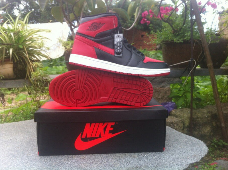 Men's Jordan 1 High Black Red Basketball Shoes 555088-123 - product image from the listing.