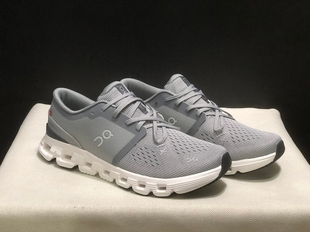 On Cloud X 4 Sneakers in Alloy and in Ivory - product image from the listing.
