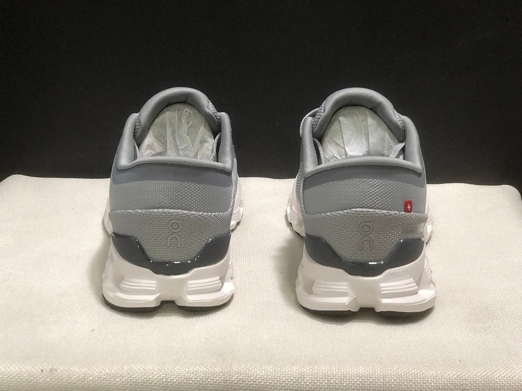 On Cloud X 4 Sneakers in Alloy and in Ivory - product image from the listing.