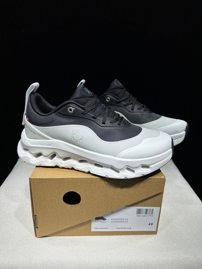 On Cloudtilt 2.0 Sneakers in White and Black - product image from the listing.