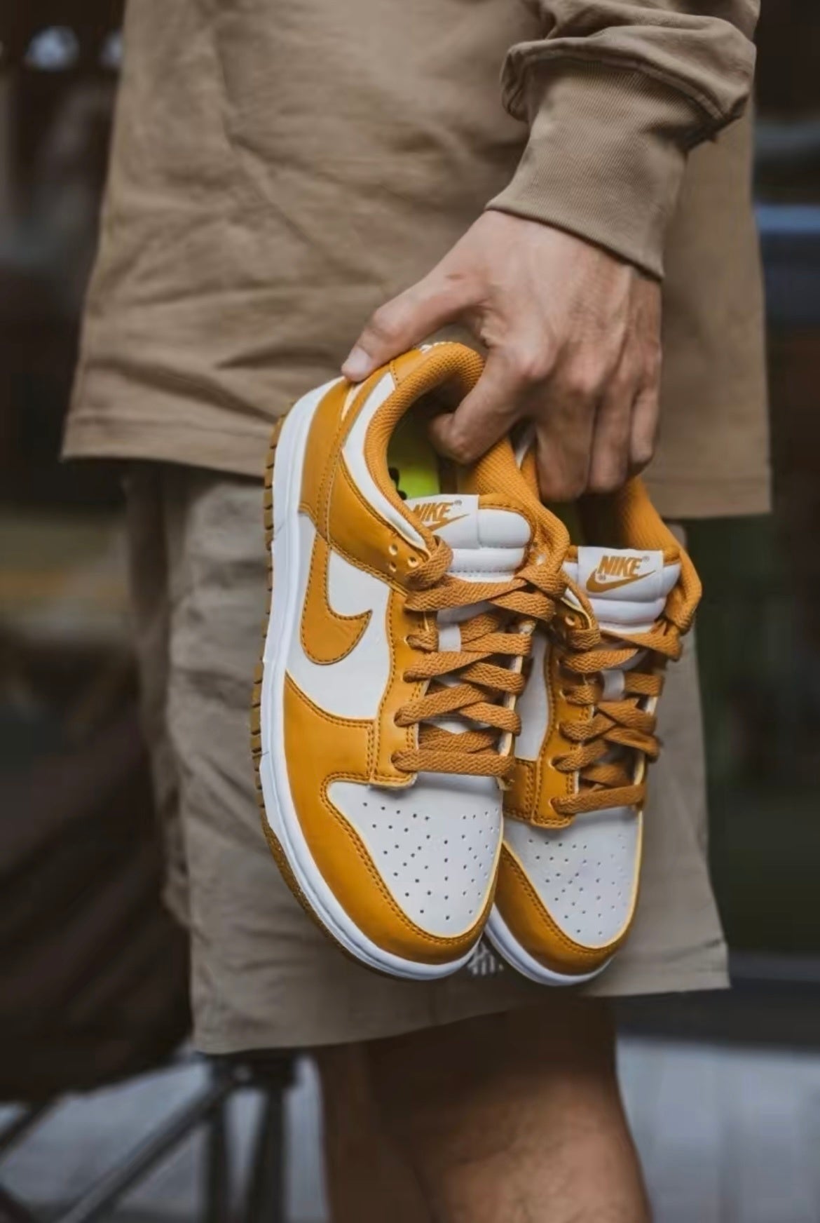 Nike Dunk Low Next Nature Sneakers in White and Brown DN1431-001 - product image from the listing.