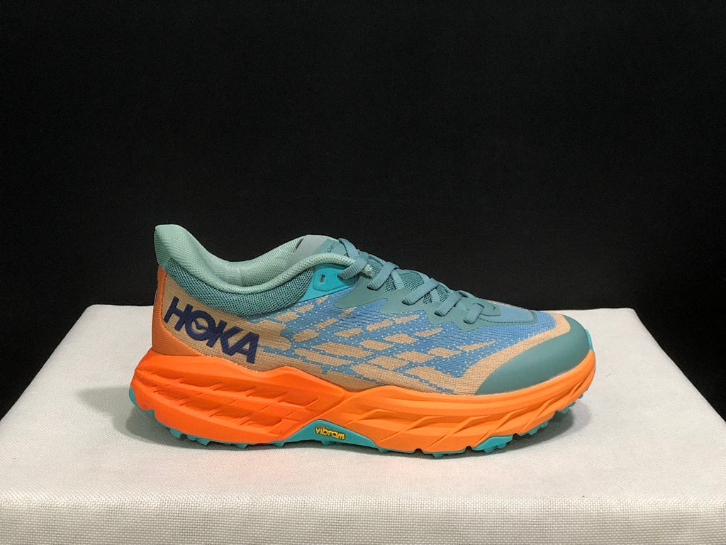 HOKA Speedgoat 5 Trail Running Shoes in Blue Orange - product image from the listing.