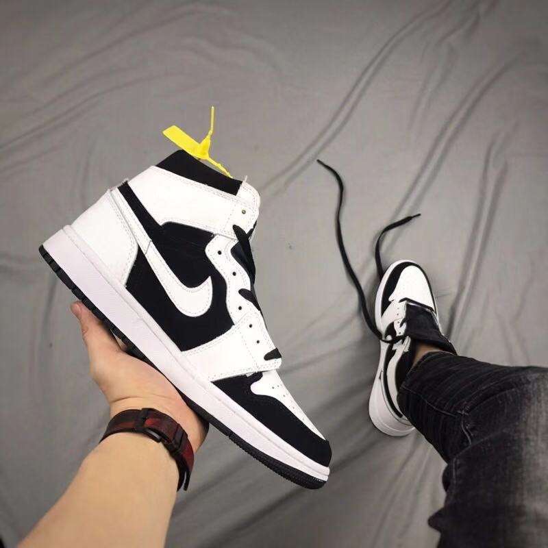 Air Jordan 1 High Sneakers in Black and White - product image from the listing.