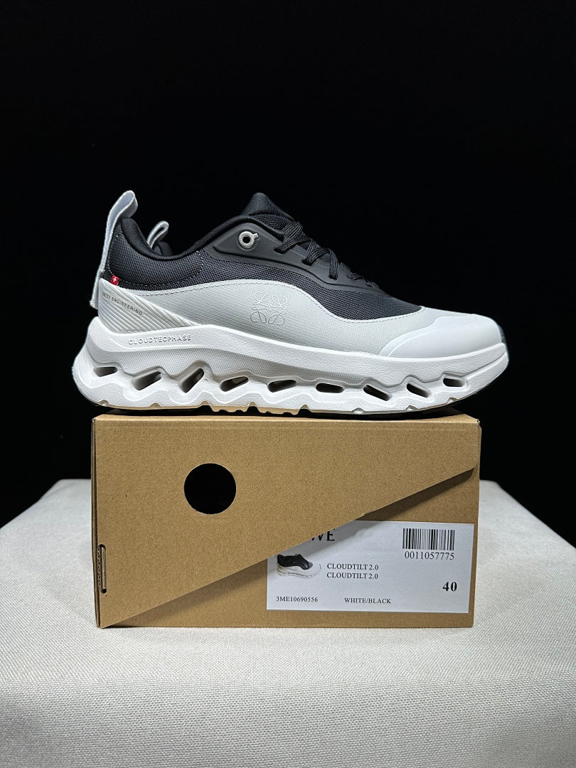 On Cloudtilt 2.0 Sneakers in White and Black - product image from the listing.