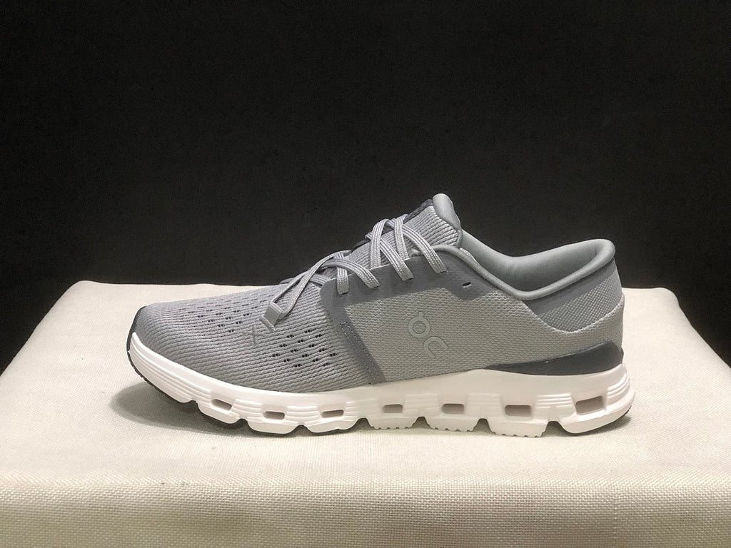 On Cloud X 4 Sneakers in Alloy and in Ivory - product image from the listing.