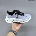 White and Black On Cloudtilt Sneakers - product image from the listing.