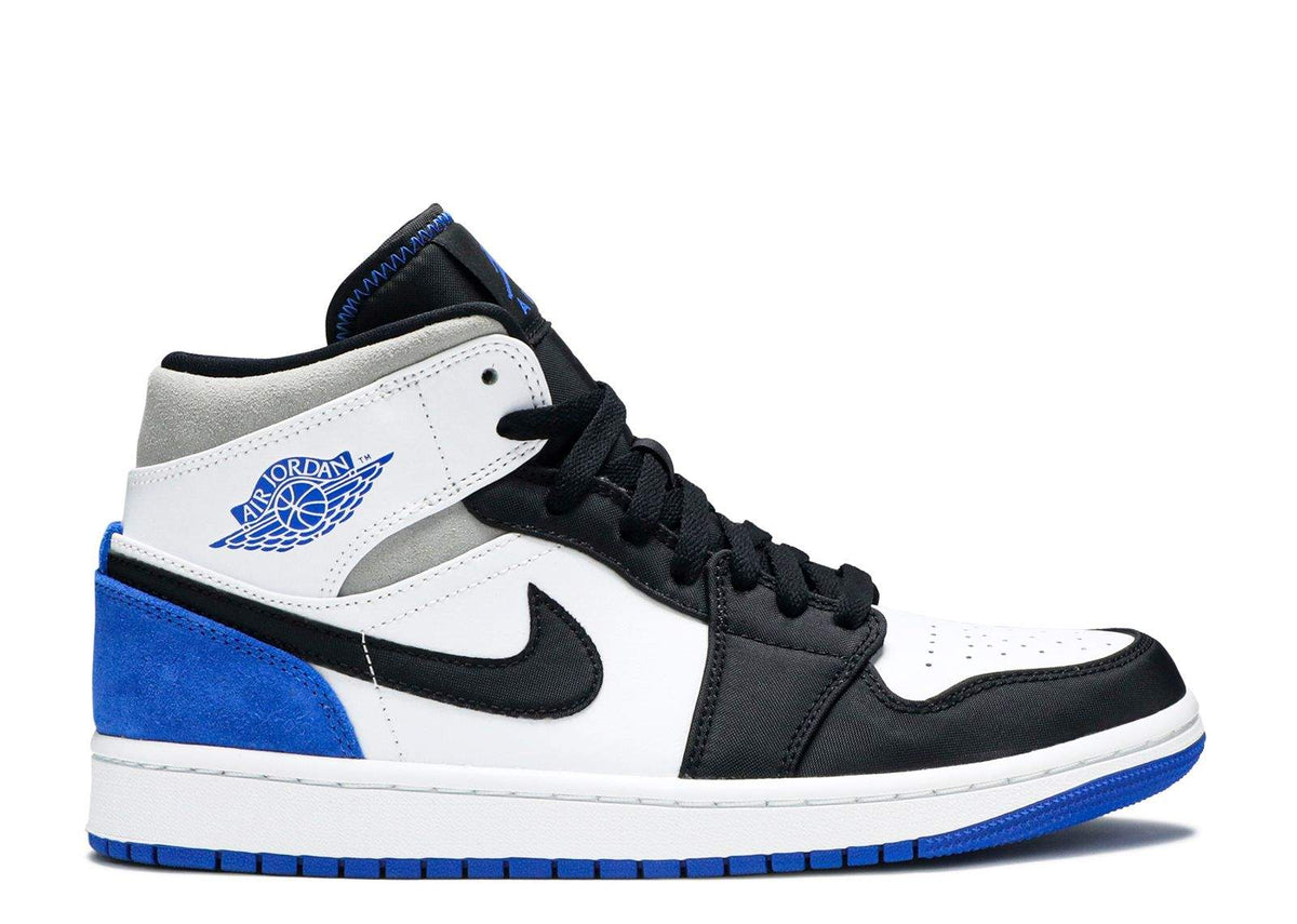 Air Jordan 1 Mid SE 'Royal Black Toe' Footwear - product image from the listing.
