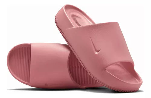 Women's Nike Calm Slides - Canyon Pink / Canyon Pink / Canyon Pink - product image from the listing.