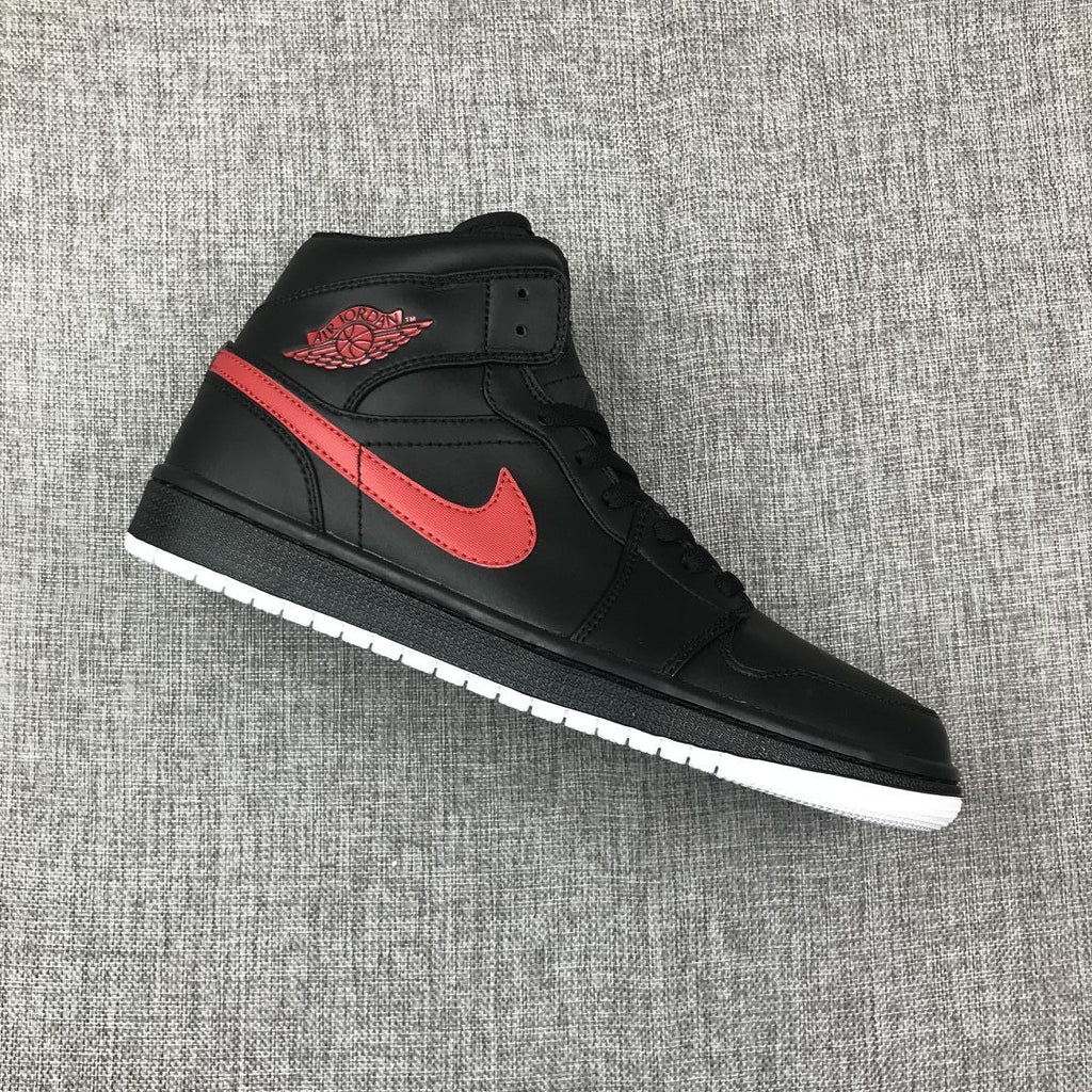Air Jordan 1 Mid Sneakers in Black and Red 554724-045 - product image from the listing.