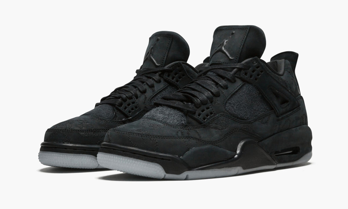 "Kaws - Black" Air Jordan 4 Retro - product image from the listing.