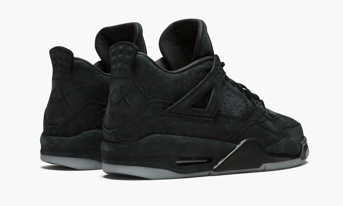 "Kaws - Black" Air Jordan 4 Retro - product image from the listing.