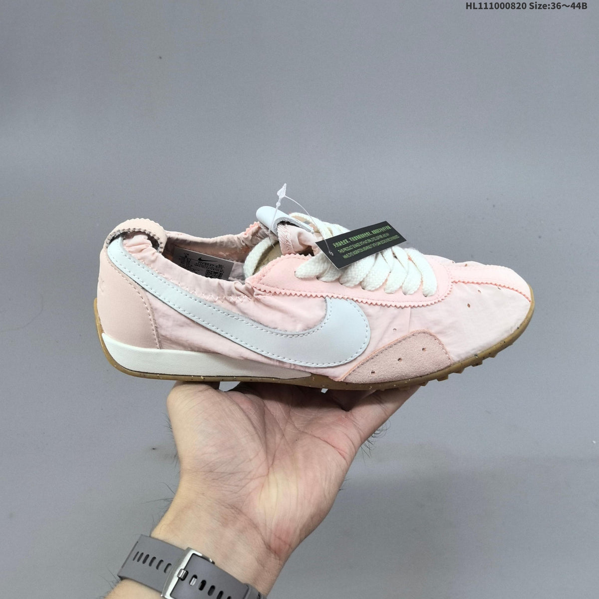 Pink Jacquemus x Nike Jacumoon Low-Top Sneakers - product image from the listing.