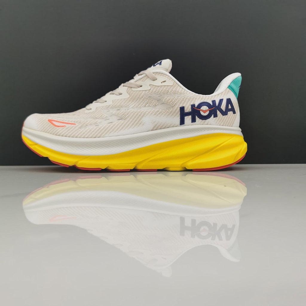 Cream and Yellow HOKA Clifton 9 Running Shoes - product image from the listing.