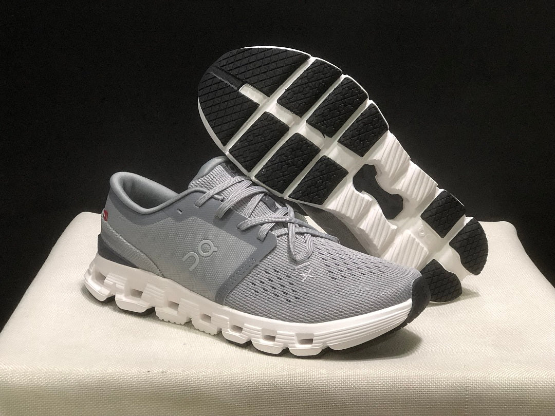 On Cloud X 4 Sneakers in Alloy and in Ivory - product image from the listing.