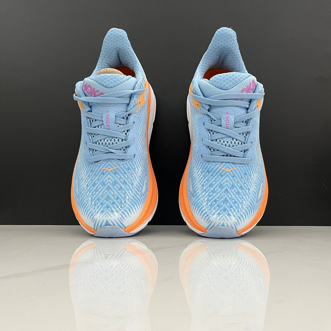 HOKA Clifton 9 Running Shoes in Blue and Orange - product image from the listing.