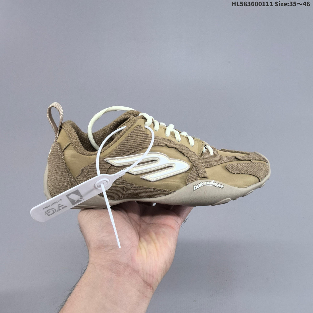 Balenciaga Track Sneaker in Black and Taupe HL583600111 - product image from the listing.
