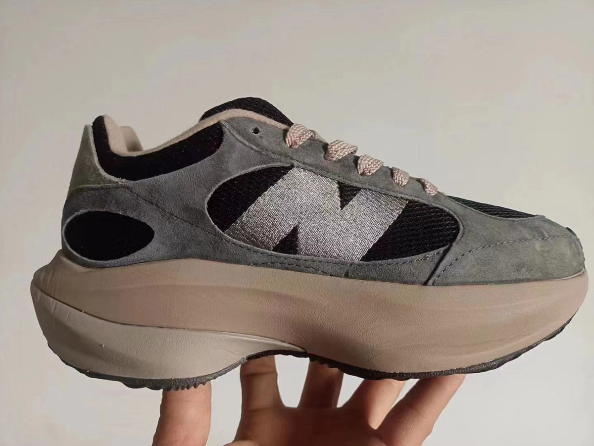 New Balance 9060 Grey and Black Chunky Trainers - product image from the listing.