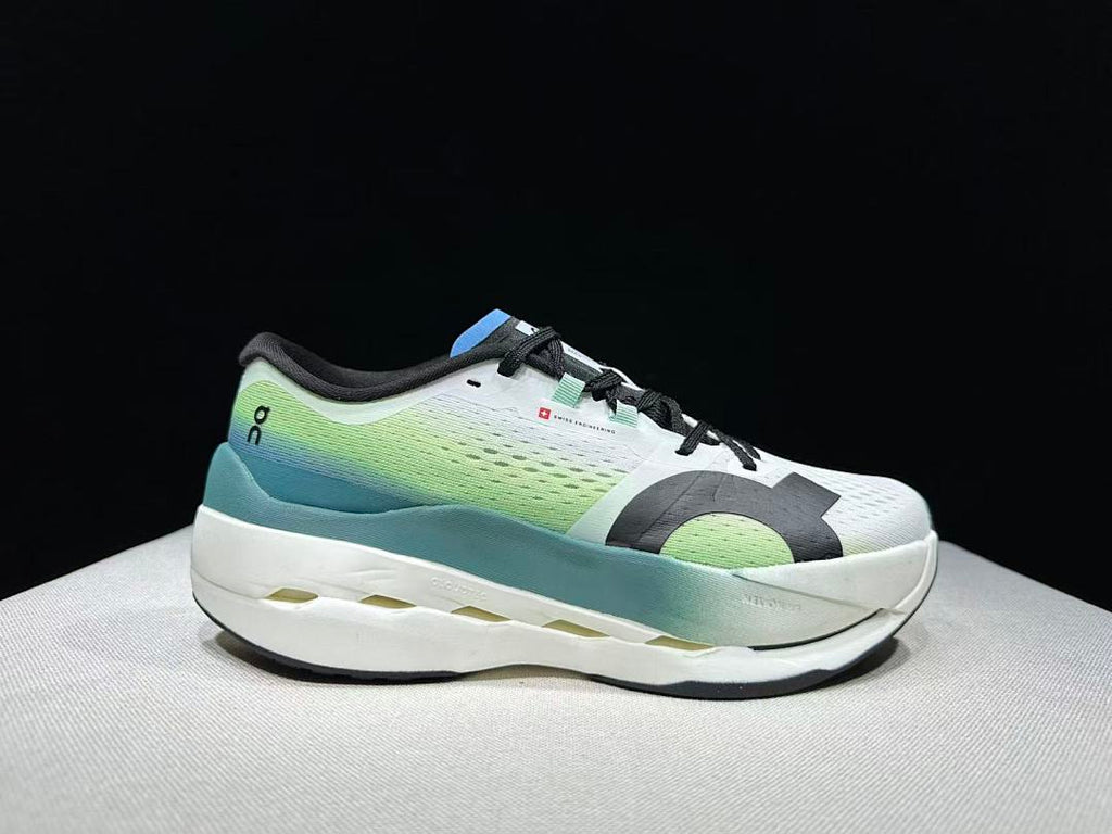 On Cloudboom Max Running Shoes, in White and Green - product image from the listing.