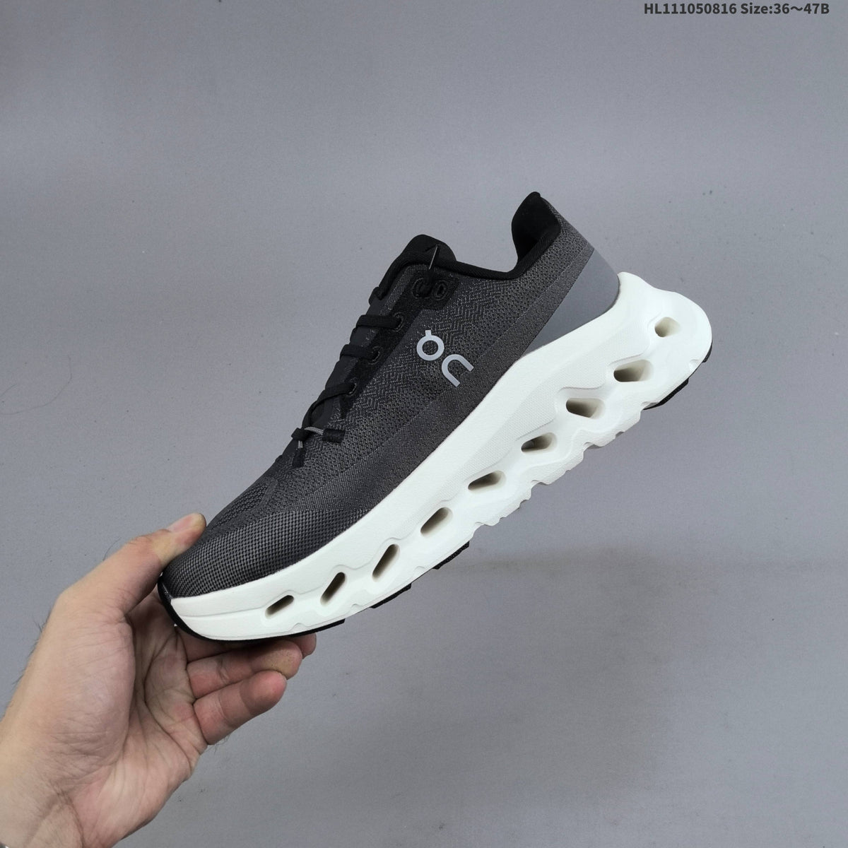 On Cloudtilt Sneakers in Black and White or in Peach - product image from the listing.