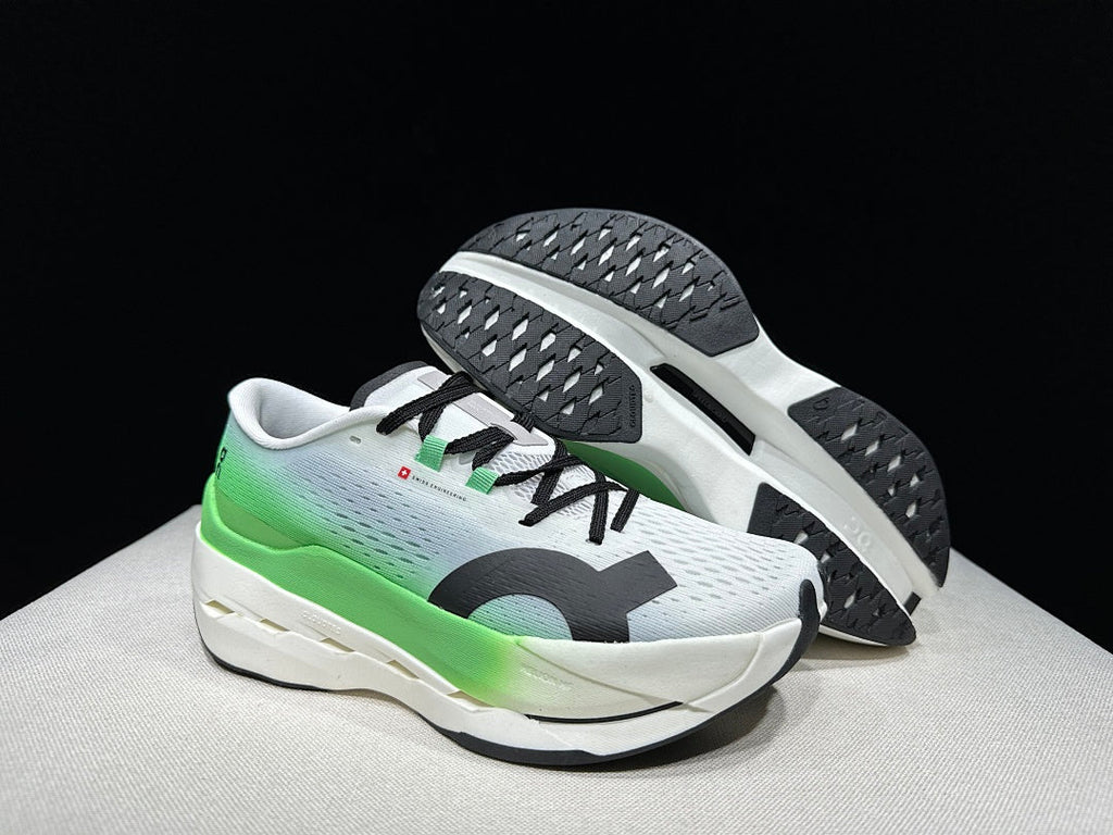On Cloudboom Max Running Shoes, in White and Green - product image from the listing.