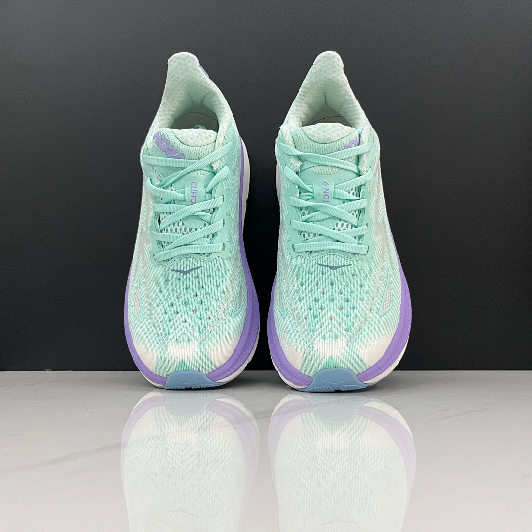 HOKA Clifton 9 Running Shoes, in Mint Green and Purple - product image from the listing.