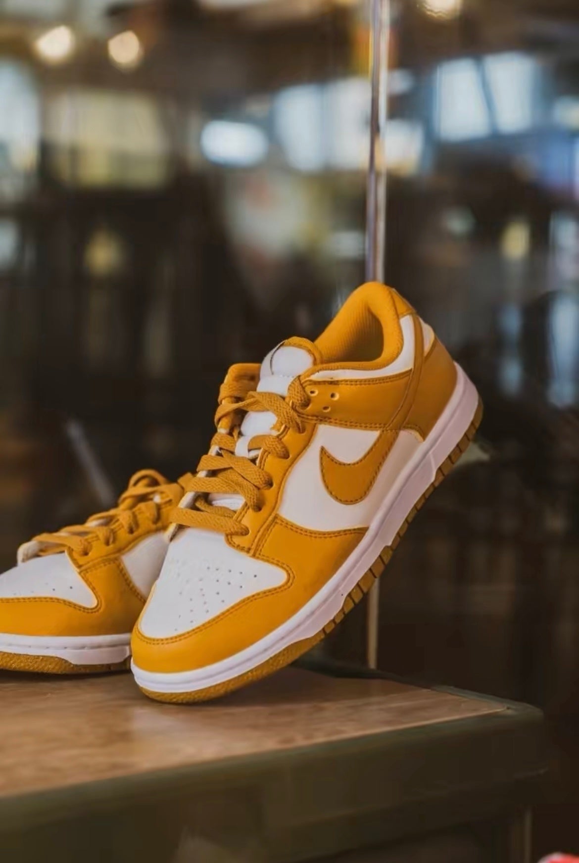 Nike Dunk Low Next Nature Sneakers in White and Brown DN1431-001 - product image from the listing.