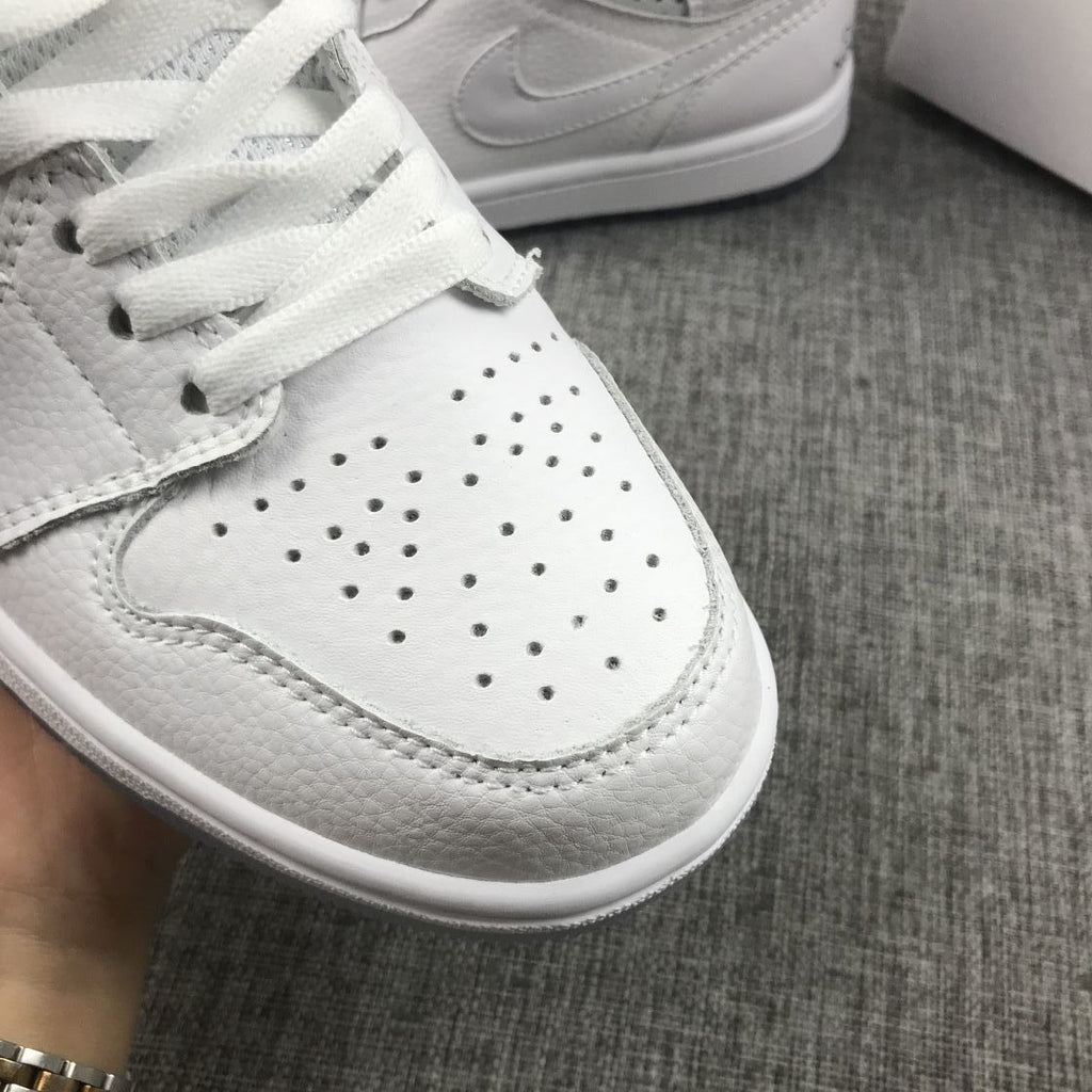 Air Jordan 1 Mid Unite Totale Sneakers in White CI9100-100 - product image from the listing.