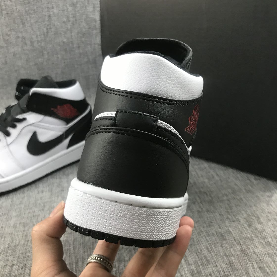 Jordan 1 Mid Reverse Black Toe Sneakers in Black and White BQ6472-101 - product image from the listing.