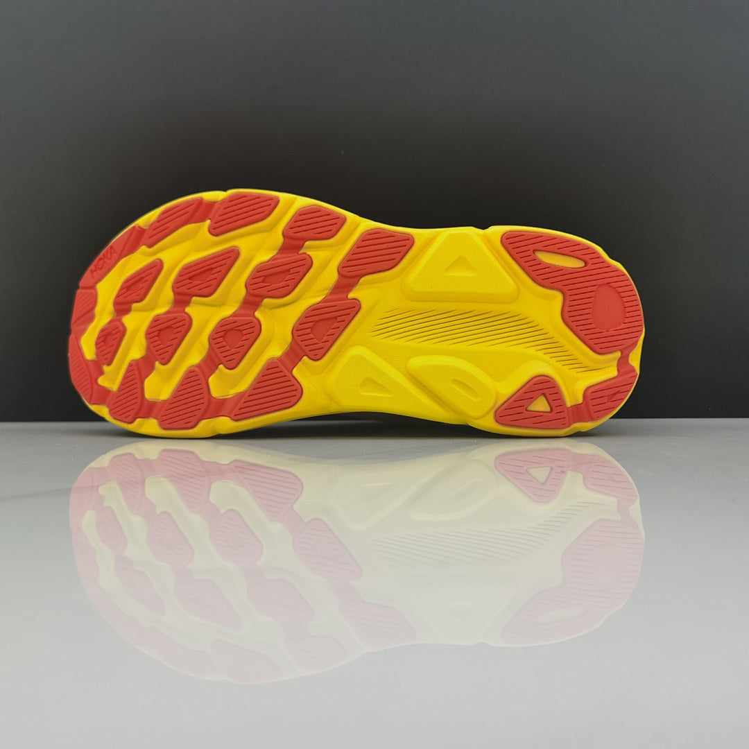 Cream and Yellow HOKA Clifton 9 Running Shoes - product image from the listing.