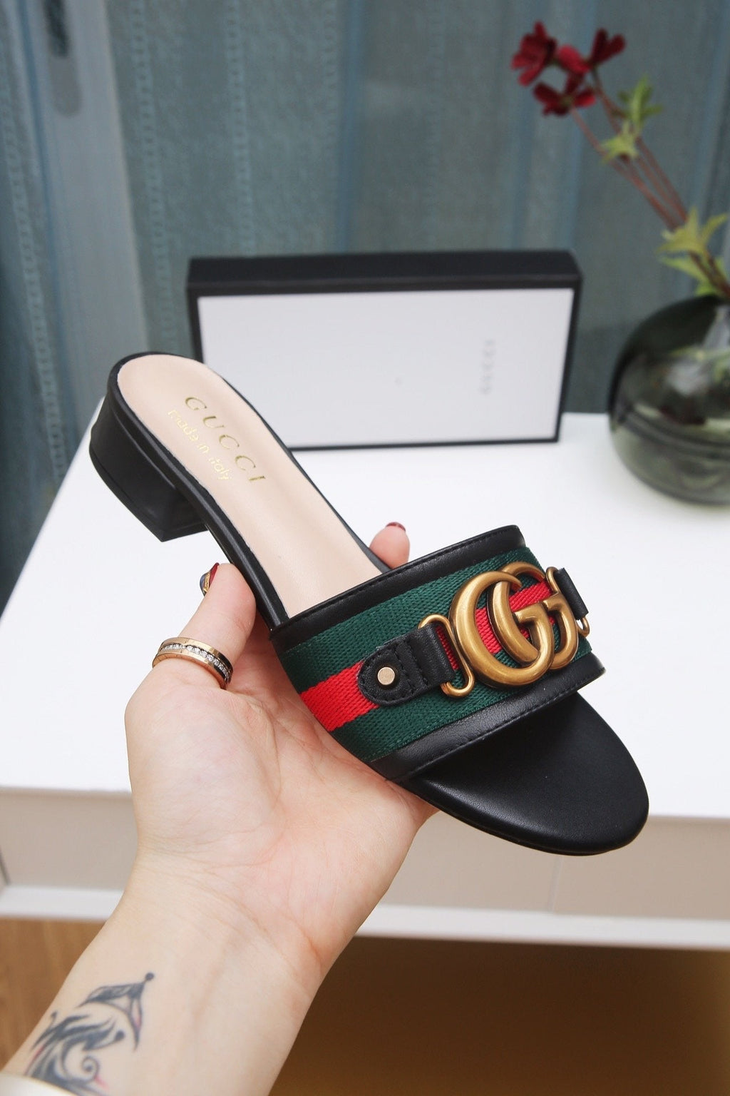 slides by Gucci - product photo shown in the listing for this item.