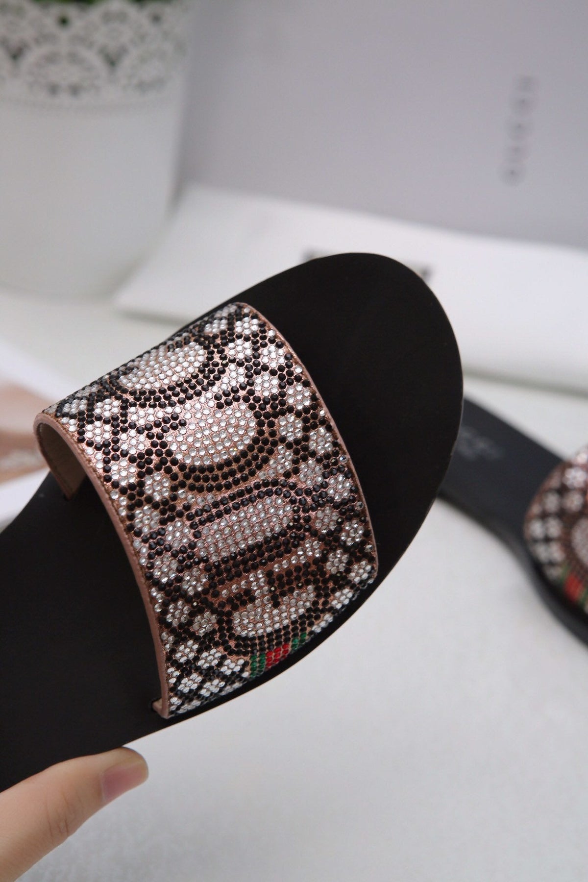 slides by Gucci - product photo shown in the listing for this item.